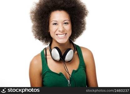 Beautiful happy woman with headphones looking to the camera, isolated on white