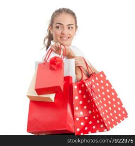 Beautiful Happy Young Woman Holding Shopping Bags. Red and White Colors.