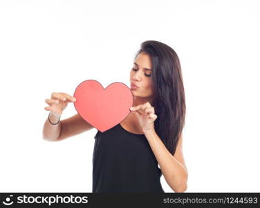 beautiful happy young woman who is holding a big red heart for valentine&rsquo;s day