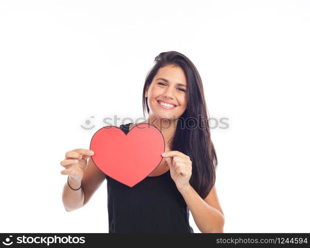 beautiful happy young woman who is holding a big red heart for valentine&rsquo;s day