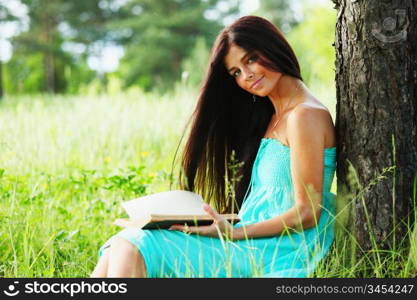 Beautiful Healthy Woman over Nature background