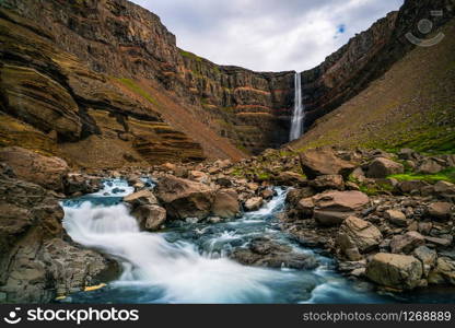 Beautiful Hengifoss Waterfall in Eastern Iceland. Nature travel landscape.