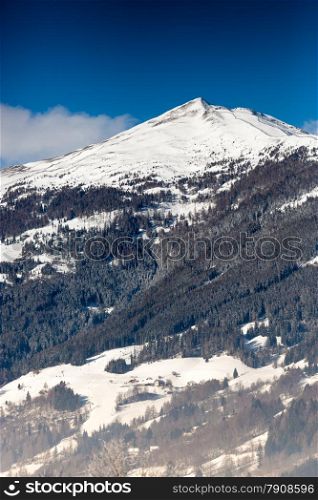 Beautiful high mountain in Austrian Alps covered by snow at sunny day