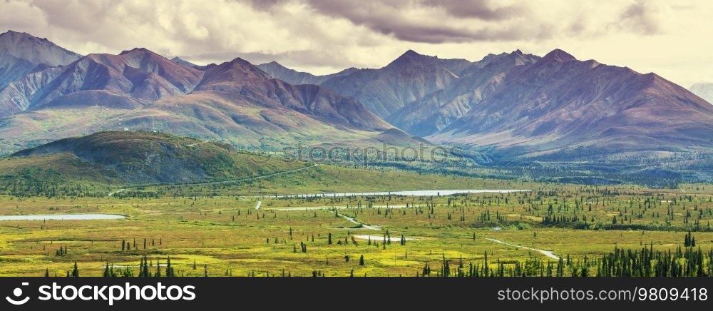 Beautiful high mountains in Alaska, United States. Amazing natural background.