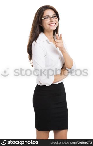 Beautiful hispanic business woman smiling with and pointing, over a white background. Business woman