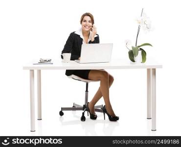 Beautiful hispanic business woman working in the office, isolated over a white background