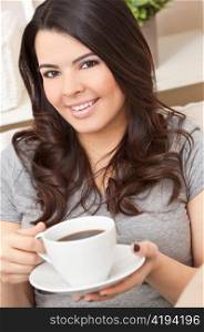 Beautiful Hispanic Latina Woman Drinking Tea or Coffee