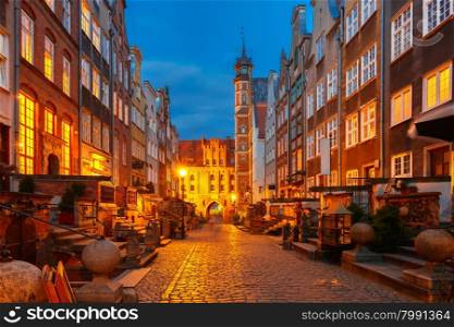 Beautiful historic houses on Mariacka, St Mary, street and gate in Gdansk Old Town, Poland