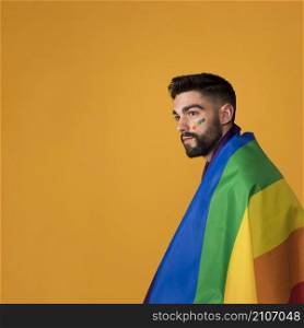 beautiful homosexual wrapping rainbow flag