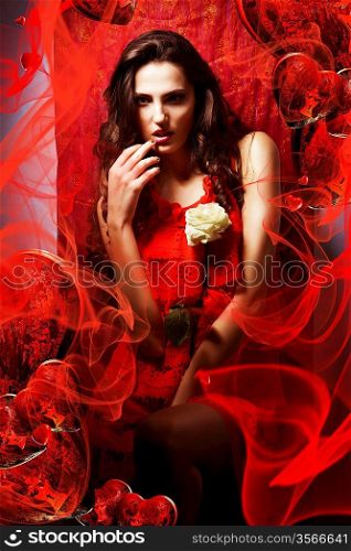 beautiful hot woman in love in red dress around fabric