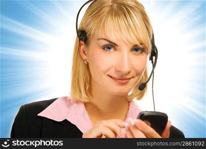 Beautiful hotline operator with cellphone in her hands on abstract background