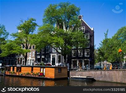 Beautiful houses on a canal in Amsterdam