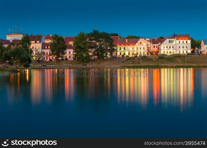 beautiful houses on the river bank at sunset