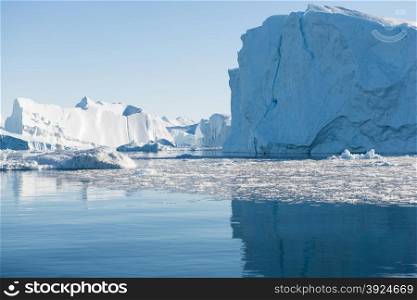 Beautiful Icebergs. Beautiful Icebergs in Disko Bay Greenland around Ilulissat with blue sky