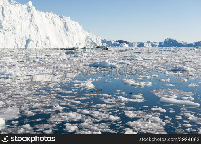 Beautiful Icebergs. Beautiful Icebergs in Disko Bay Greenland around Ilulissat with blue sky