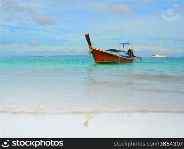 Beautiful image Longtail boat on the sea tropical beach. Andaman Sea, Thailand