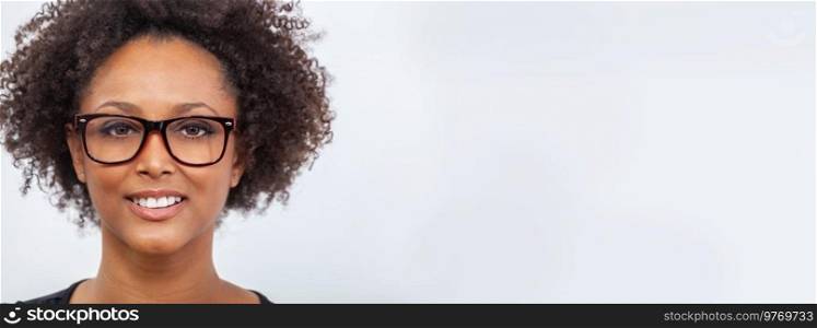 Beautiful intelligent mixed race African American girl or young woman female smiling with perfect teeth and wearing glasses. Panoramic web banner header.