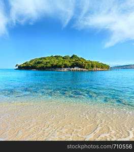 Beautiful Ionian Sea with clear turquoise water and morning summer coast view from beach, Ksamil, Albania.