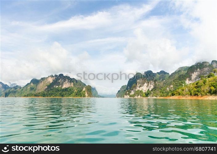 Beautiful island and green lake in summer at Ratchaprapha Dam, Khao Sok National Park, Surat Thani Province, Guilin of Thailand
