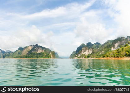 Beautiful island and green lake in summer at Ratchaprapha Dam, Khao Sok National Park, Surat Thani Province, Guilin of Thailand