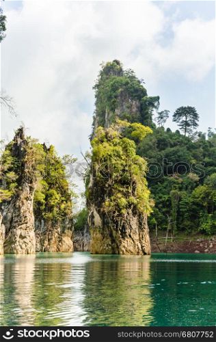 Beautiful island and green lake in the morning at Ratchaprapha Dam, Khao Sok National Park, Surat Thani Province, Thailand ( Guilin of Thailand )