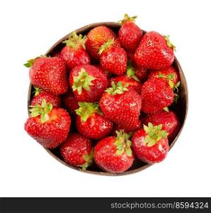 Beautiful juicy ripe red strawberry in a wooden plate isolated on a white background. Top view