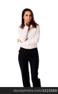 Beautiful kind smiling successful Caucasian Hispanic entrepreneur business woman standing, wearing dark blue pants and pink shirt with hand on cheek, isolated.