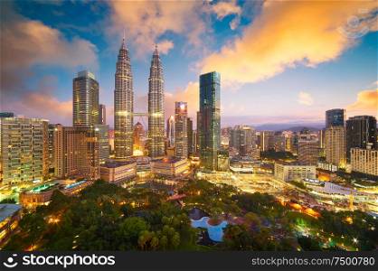 Beautiful Kuala Lumpur city skyline with dramatic sky , twilight scene . Malaysia .