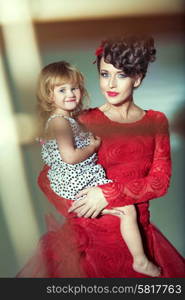 Beautiful lady with her joyful daughter