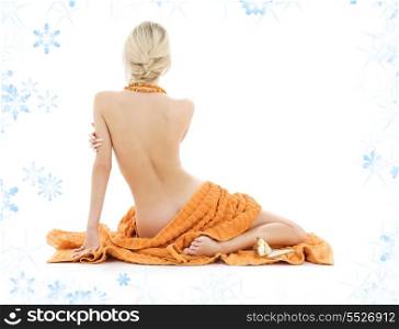 beautiful lady with orange towels and snowflakes