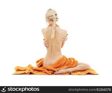 beautiful lady with orange towels over white