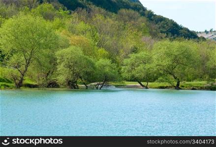 beautiful lake and spring rocks mountain behind (Crimea, Ukraine)