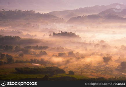 Beautiful landscape at sunrise sky with clouds on peak of mountains.