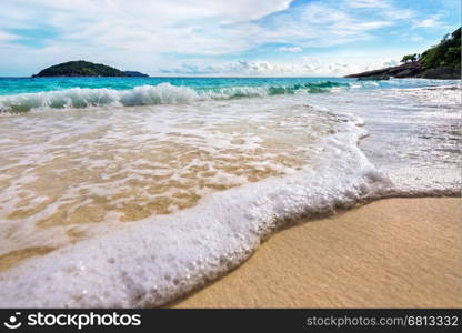 Beautiful landscape blue sea white sand and waves on the beach during summer at Koh Miang island in Mu Ko Similan National Park, Phang Nga province, Thailand