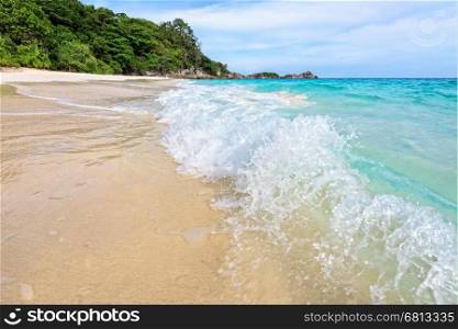 Beautiful landscape blue sea white sand and waves on the beach during summer at Koh Miang island in Mu Ko Similan National Park, Phang Nga province, Thailand
