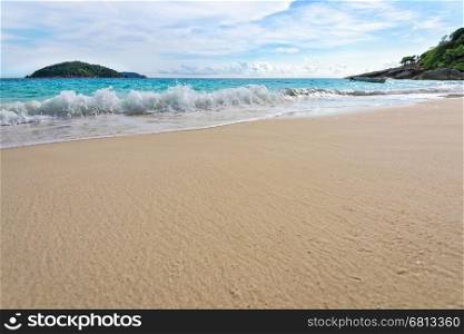 Beautiful landscape blue sea white sand and waves on the beach during summer at Koh Miang island in Mu Ko Similan National Park, Phang Nga province, Thailand