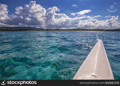 Beautiful landscape from the catamaran to Atlantic ocean and coastline, Turquoise water and blue sky with clouds. Cuba