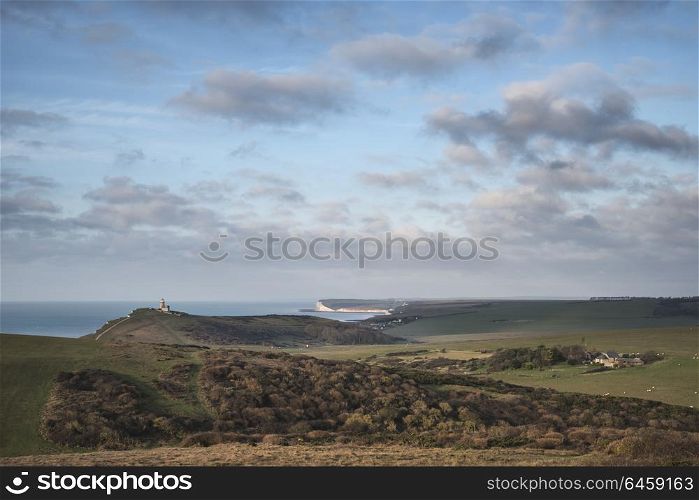 Beautiful landscape image of Belle Tout lighthouse on South Downs National Park during stormy sky
