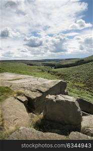 Beautiful landscape image of Burbage Edge and Rocks in Summer in Peak District England