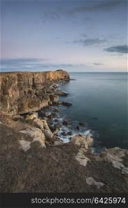 Beautiful landscape image of cliffs around St Govan&rsquo;s Head on Pembrokeshire Coast in Wales