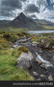 Beautiful landscape image of countryside around Llyn Ogwen in Snowdonia during early Autumn