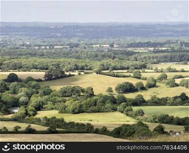Beautiful landscape image of English countryside on lovely Summer afternoon overlooking rolling hills