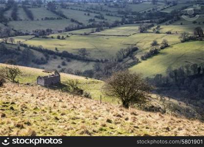 Beautiful landscape image of Peak District on bright sunny Spring day
