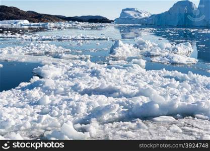 Beautiful Landscape in Greenland with Icebergs. Beautiful Landscape in Greenland with Icebergs and blue Sky