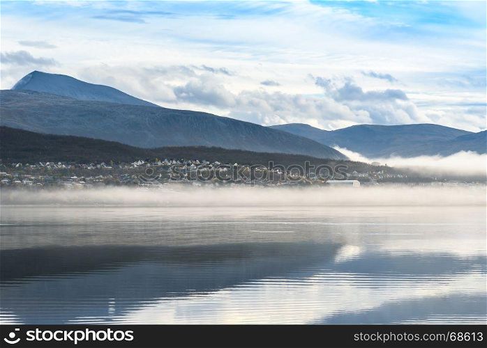 beautiful landscape misty fog over the lake, Tromso, Norway