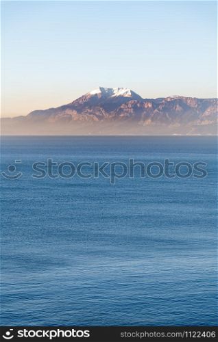 Beautiful landscape, mountains with snow and sea. mountains with snow
