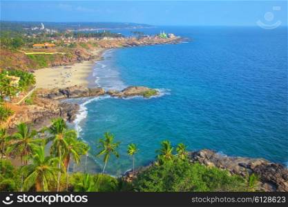 Beautiful landscape of beach and clear turquoise sea. Thiruvananthapuram, India