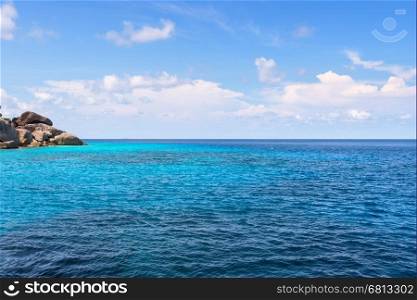 Beautiful landscape of clear sky over small island and blue sea middle Andaman Ocean in summer at Mu Koh Similan National Park, Phang Nga Province, Thailand