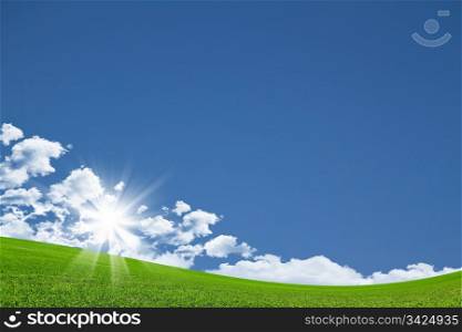 Beautiful landscape of green field and blue sky
