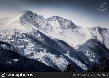 Beautiful landscape of high Alps covered by snow at morning